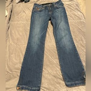Y2K vintage juniors Roca Wear jeans with button detail on flare bottom